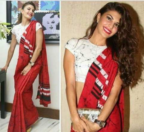 printed red saree with white blouse